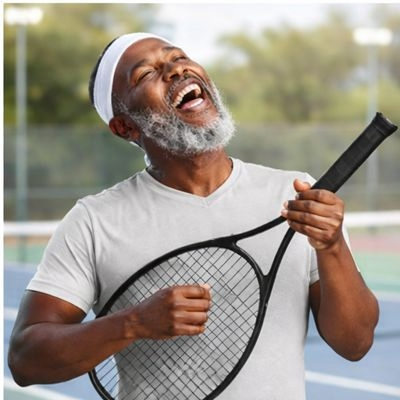Man with tennis racket